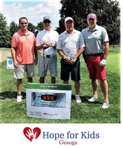 service tech team golfing for kids