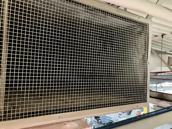 After: the same intake screen cleaned and open after Service-Tech air duct cleaning