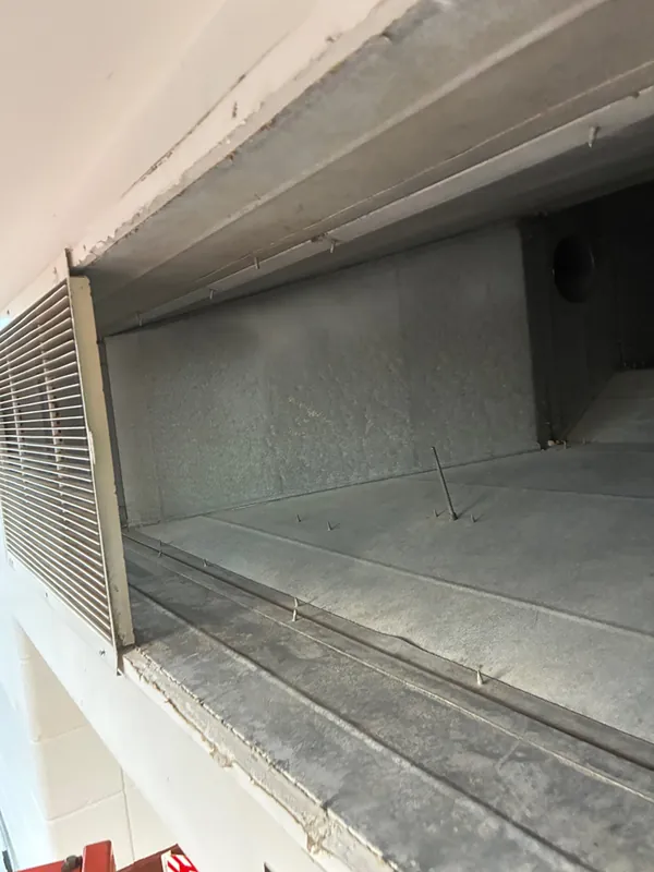 After: the same return air plenum cleaned to bare metal after Service-Tech air duct cleaning